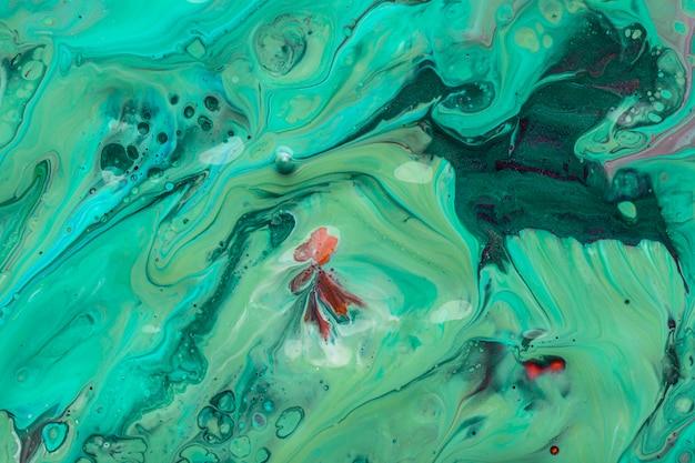 Mieszanka tekstury artystycznej zieleni i błękitu farby akrylowej