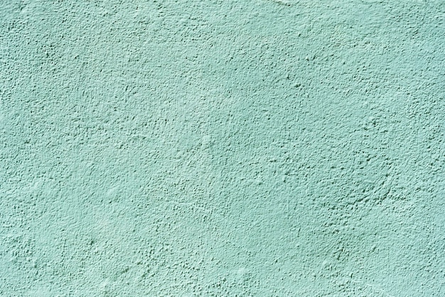 Miętowa tekstura ściany na tle