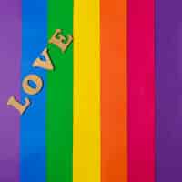 Bezpłatne zdjęcie miłość słowo i flaga lgbt