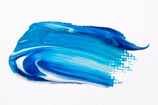 Niebieska farba rozmazująca teksturowana grafika kreatywna pociągnięcia pędzlem