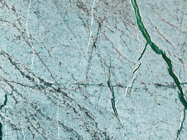 Bezpłatne zdjęcie niebieski marmur kamień teksturowanej tło