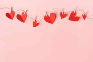 Bezpłatne zdjęcie papierowe walentynki serca na różowo