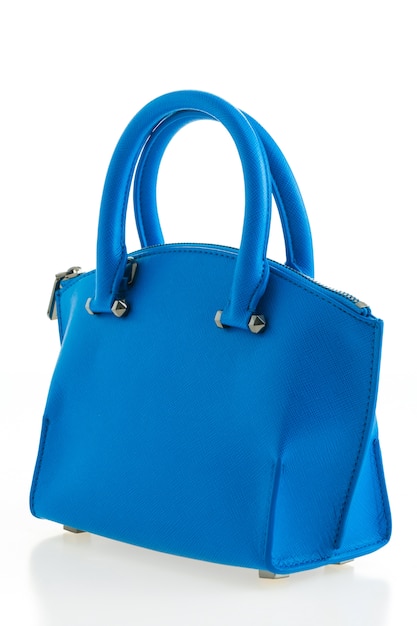 Piękna elegancja i luksusowe kobiety modne i niebieska torebka