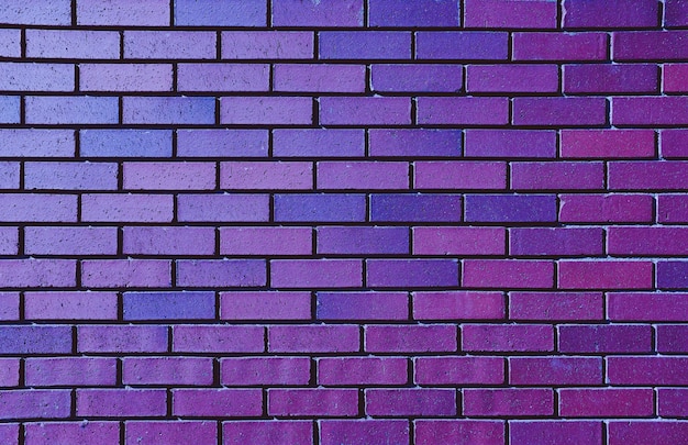 Bezpłatne zdjęcie piękny purpurowy ściana z cegieł dla tła
