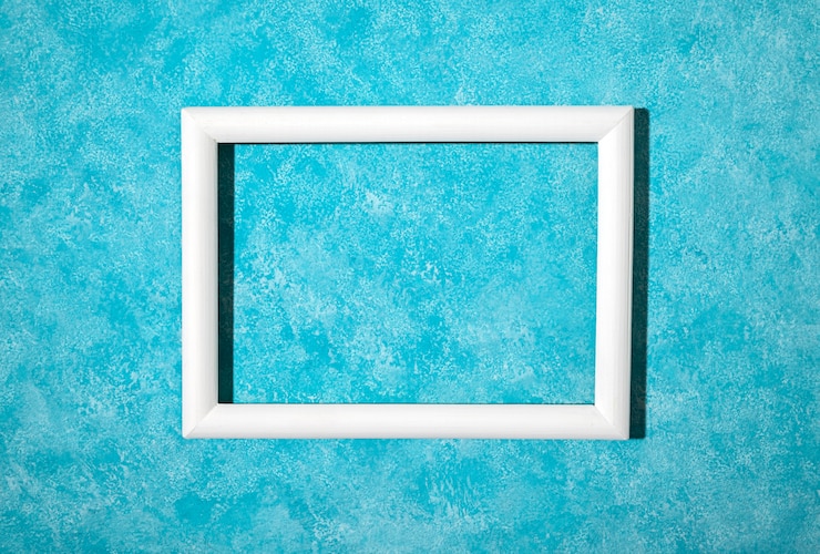 Bezpłatny plik Zdjęcie płaska biała ramka na niebieskim tle