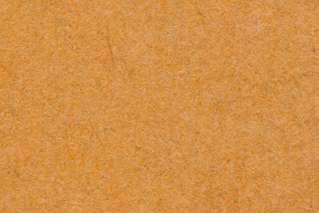 Pomarańczowy tekstury papieru z recyklingu