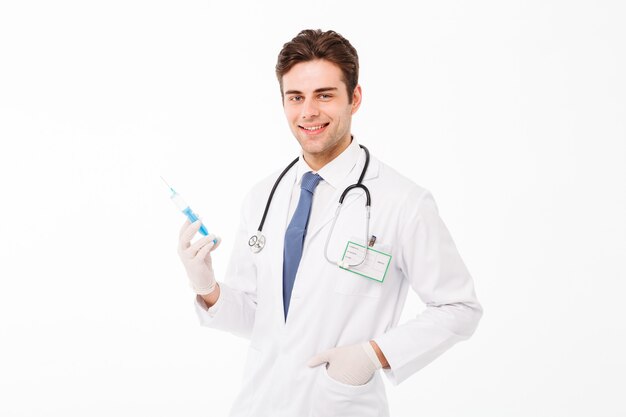 Portret uśmiechnięta młoda samiec lekarka z stetoskopem