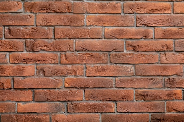 Poziomy widok brązowego tła ściany z cegły