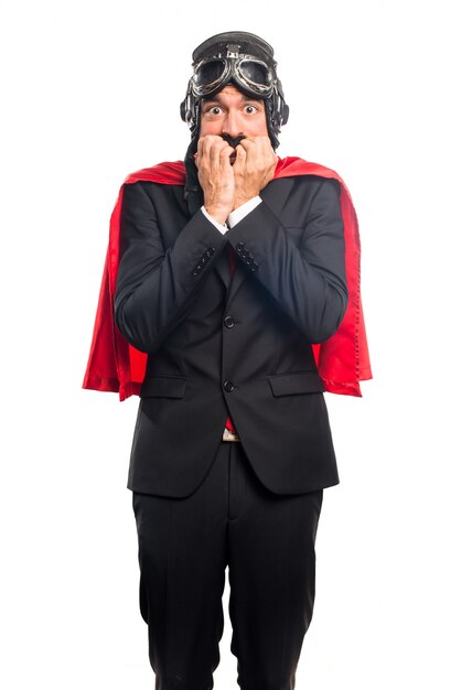 Przerażony biznesmen super hero