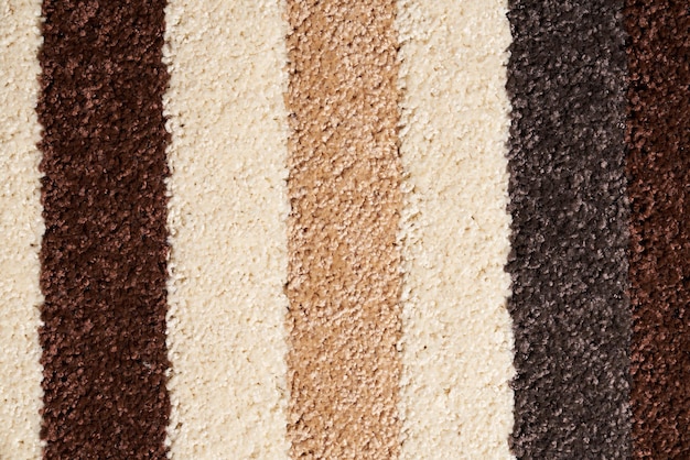 Pstrobarwny dywan w paski tło z wełnianą teksturą stosu