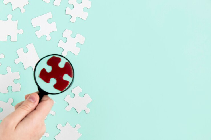 Bezpłatny plik Zdjęcie puzzle z lupą