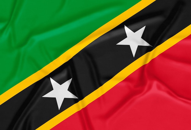 Bezpłatne zdjęcie realistyczne tło flagi saint kitts i nevis