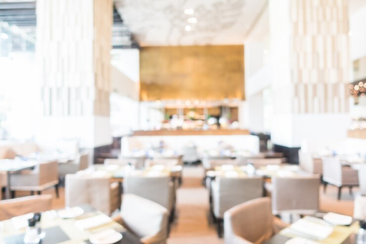 Bezpłatny plik Zdjęcie rozmyte tło z restauracji z wygodnymi fotelami