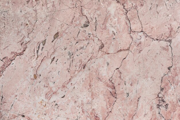 Różowy marmurowy teksturowany wzór tła