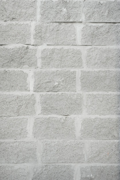 Bezpłatne zdjęcie Ściana z szarej cegły