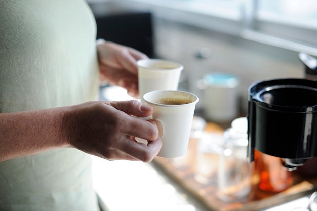 Starcie Business Hands Holding Coffee Cups