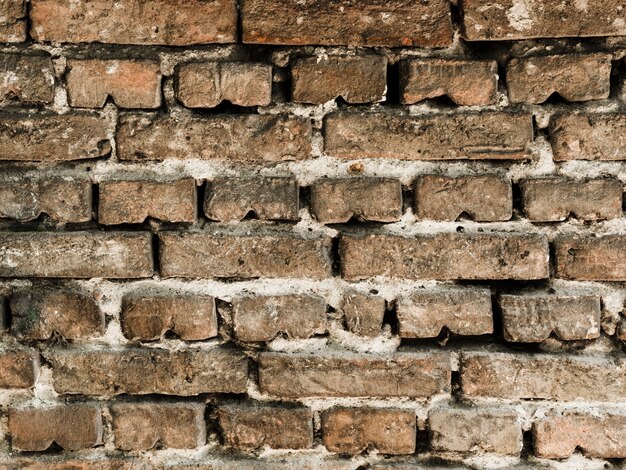 Stary mur z cegły teksturowanej tło