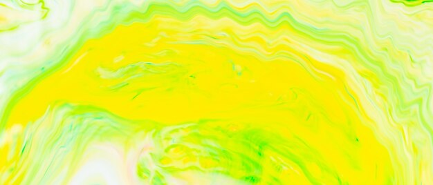 Streszczenie żółto-zielone tło płynne. zielony wzór farby z cyklicznymi zawijasami. modna tapeta. koncepcja ekologiczna