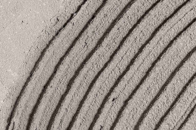 Szara krzywa wzorzyste betonowe teksturowane tło