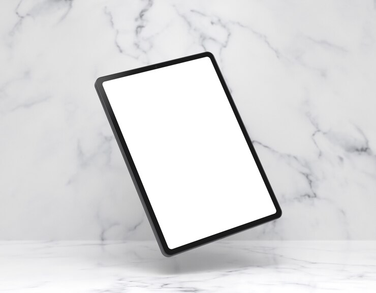Bezpłatny plik Zdjęcie tablet na marmurowym stole