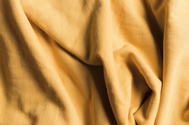 Tekstura piaskowa brązowa zmięta tkanina
