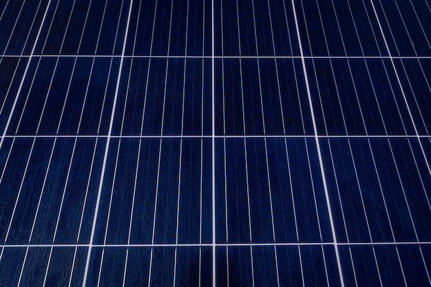Tekstura tło panelu słonecznego energii fotowoltaicznej, koncepcja alternatywnej energii, czysta energia, zielona energia.