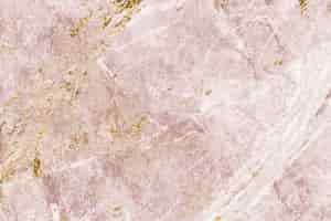 Bezpłatne zdjęcie teksturowany marmur w kolorze różowym i złotym