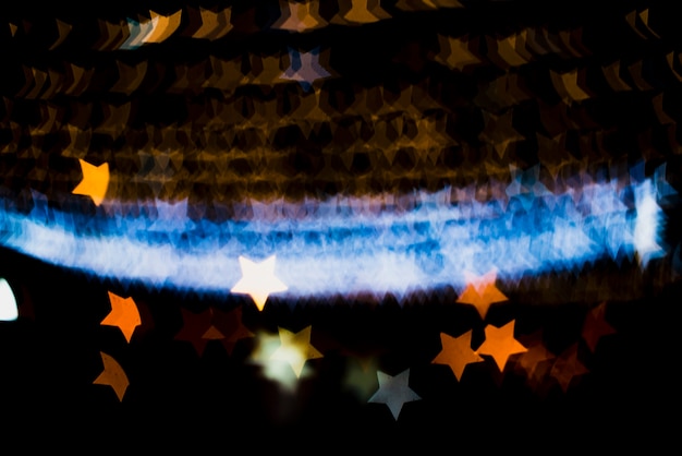 Bezpłatne zdjęcie tło neonowe światła w kształcie gwiazdy