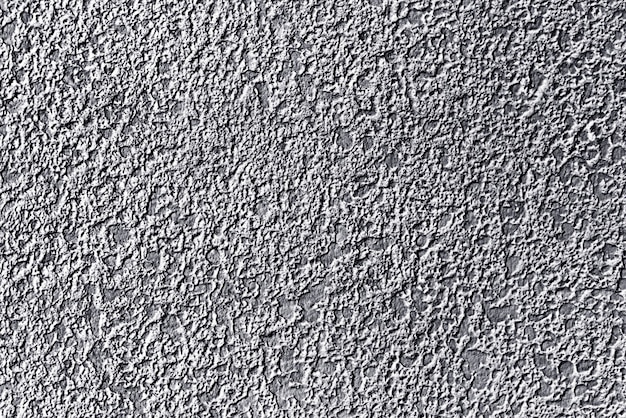 Tło powierzchni ściany betonowej pomalowanej na srebrno