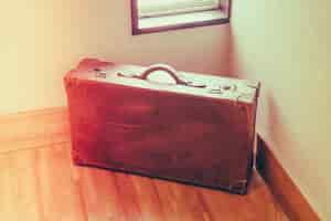 Bezpłatne zdjęcie vintage brązowy walizka (filtrowany obraz przetwarzany rocznika effec