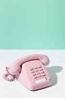 Bezpłatne zdjęcie vintage różowy układ telefoniczny