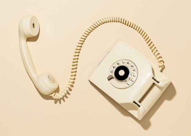 Bezpłatne zdjęcie vintage żółty układ telefoniczny