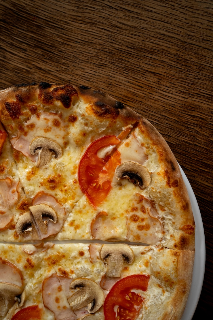 Bezpłatny plik Zdjęcie widok z góry pyszny układ pizzy