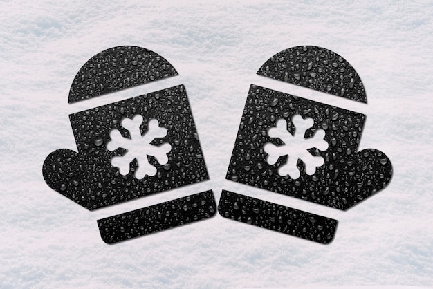 Bezpłatne zdjęcie widok z góry rękawiczki z płatkami śniegu