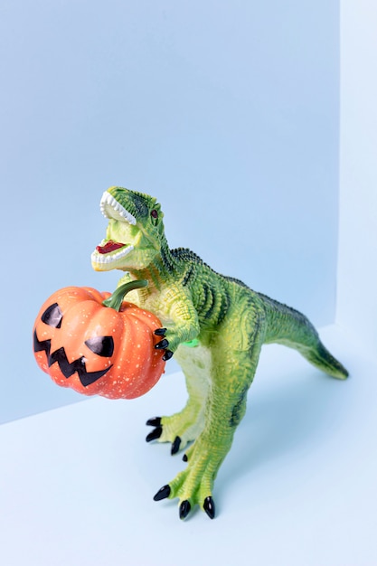 Zakończenie Halloween dinosaura zabawki mienia bania