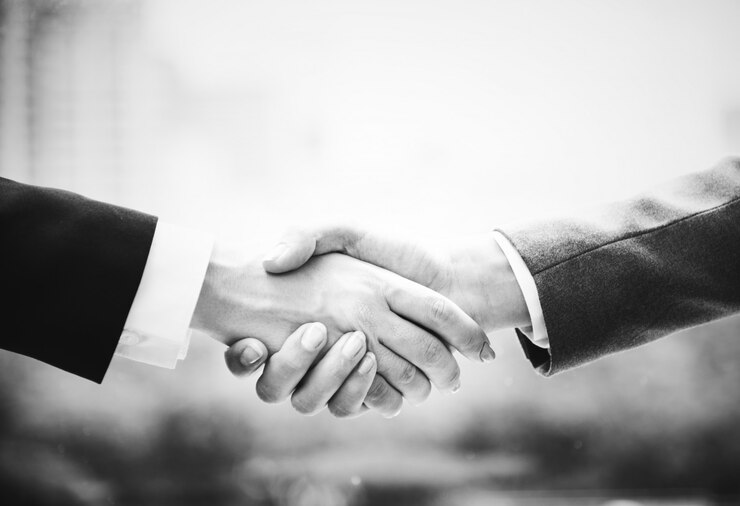 Bezpłatny plik Zdjęcie zakończenie up biznesowy uścisk dłoni