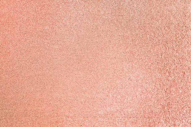Bezpłatne zdjęcie zbliżenie brzoskwiniowego brokatu teksturowanego tła