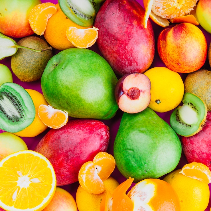 Bezpłatny plik Zdjęcie zbliżenie kiwi; mango; gruszka; owoce pomarańczowe i morelowe