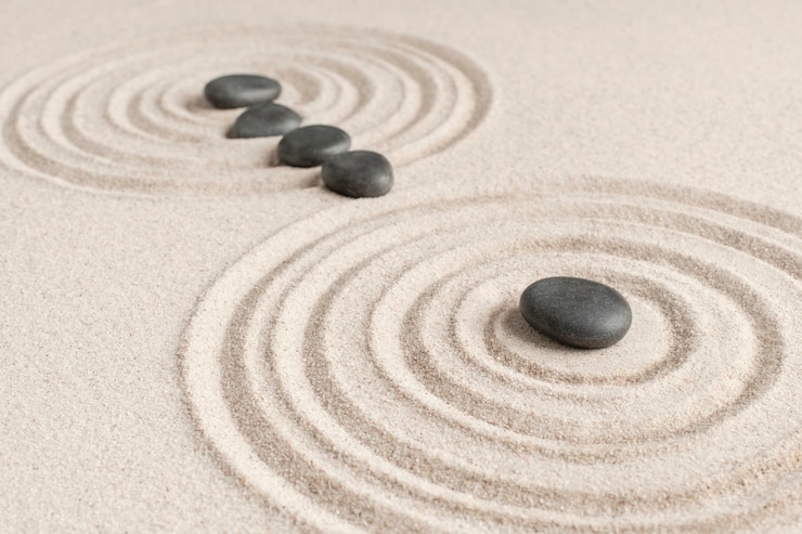 Bezpłatny plik Zdjęcie zen kamienie piasek tło zdrowie i wellness koncepcja