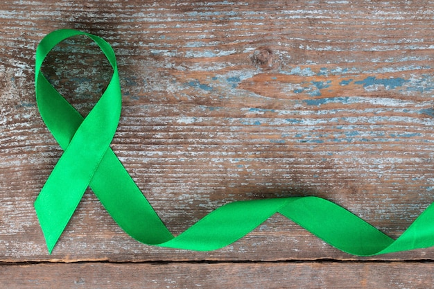 Zielona wstążka. skolioza, zdrowie psychiczne i inne, symbol świadomości