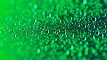 Bezpłatne zdjęcie zielone wodne kropelki abstrakta tło