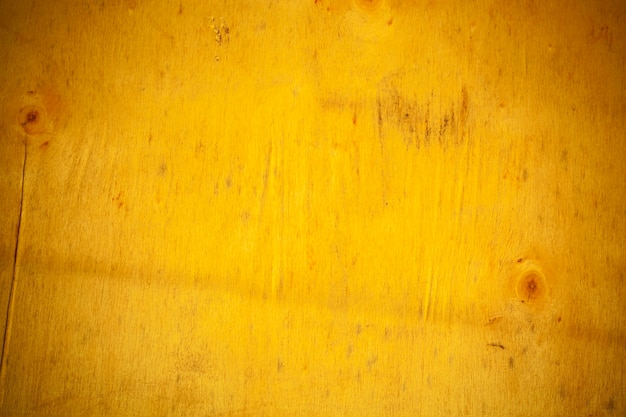 Żółte drewniane deski tło.
