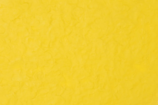 Żółte gliny teksturowane tło kolorowe ręcznie robione sztuki abstrakcyjnej stylu