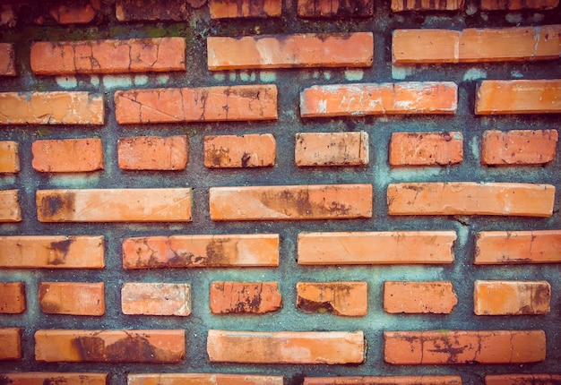 Foto gratuita agrietado muro de hormigón de ladrillo de la vendimia