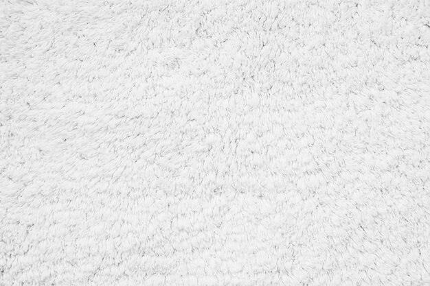 Alfombra de algodón blanco texturas y superficie.