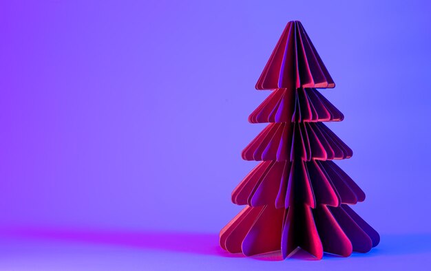 Foto gratuita Árbol de navidad de papel decorativo sobre fondo azul con luz de neón de moda