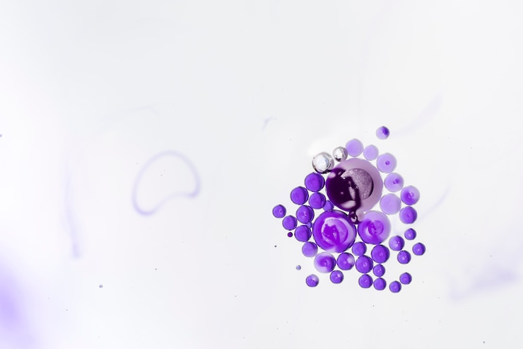Foto gratuito archipiélago de burbujas violetas en tonos grises.