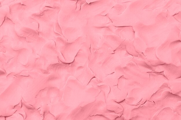 Arcilla rosa con textura de fondo colorido arte creativo hecho a mano estilo abstracto