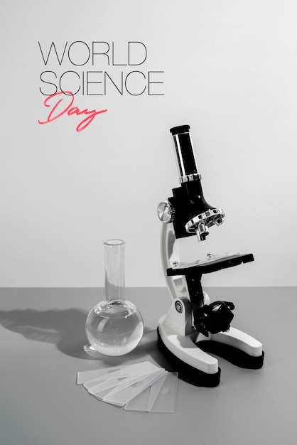 Arreglo del día mundial de la ciencia con microscopio.