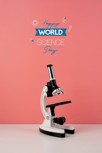 Arreglo del día mundial de la ciencia con microscopio.